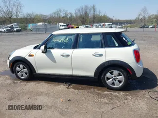 2015 MINI Hardtop 4 Door with VIN WMWXS5C53FT832742, listed as a IAAI auction lot 42059417 with 114,671 mi miles and . Bid and sale history available at DreamBid. Image 14.