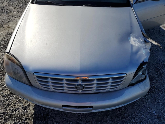 2002 Cadillac DeVille DTS with VIN 1G6KF57922U124813, listed as a Copart auction lot 87055984 with 94,769 mi miles and Salvage Title. Bid and sale history available at carsss.com. Image 12.