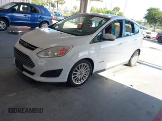 2013 Ford C-Max SE z VIN 1FADP5AU2DL541573, wystawiony jako IAAI lot #42233822 z przebiegiem 127 650 mil mil oraz . Historia ofert i sprzedaży dostępna na DreamBid. Obrazek 2.
