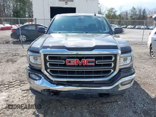 2018 GMC Sierra 1500 SLE z VIN 1GTV2MEC3JZ143967, wystawiony jako IAAI lot #41853850 z przebiegiem 80 205 mil mil oraz . Historia ofert i sprzedaży dostępna na DreamBid. Obrazek 12.