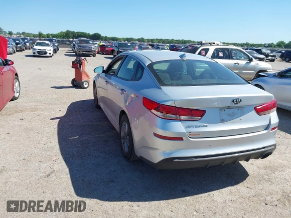 2019 Kia Optima LX with VIN 5XXGT4L3XKG294060, listed as a IAAI auction lot 42303397 with 127,081 mi miles and . Bid and sale history available at DreamBid. Image 3.