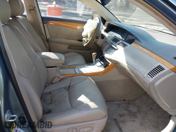2006 Toyota Avalon XL with VIN 4T1BK36B16U155649, listed as a IAAI auction lot 41427370 with 161,674 mi miles. Bid and sale history available at carsss.com. Image 5.