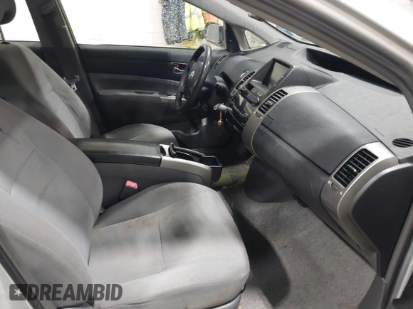 2007 Toyota Prius z VIN JTDKB20U977649489, wystawiony jako IAAI lot #41772600 z przebiegiem 248 525 mil mil oraz . Historia ofert i sprzedaży dostępna na DreamBid. Obrazek 5.
