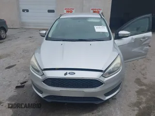 2015 Ford Focus SE with VIN 1FADP3F29FL258781, listed as a IAAI auction lot 41963223 with 121,286 mi miles and . Bid and sale history available at DreamBid. Image 12.