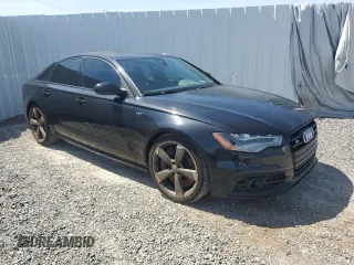 2014 Audi S6 Prestige z VIN WAUF2AFC9EN133262, wystawiony jako Copart lot #48524255 z przebiegiem 120 103 mil mil oraz Tytuł czysty. Historia ofert i sprzedaży dostępna na DreamBid. Obrazek 4.