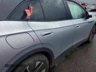 2021 Volkswagen ID.4 Pro S z VIN WVGTMPE25MP028423, wystawiony jako Copart lot #47427535 z przebiegiem Nie podano mil oraz Szkoda całkowita • Salvage title. Historia ofert i sprzedaży dostępna na DreamBid. Obrazek 10.