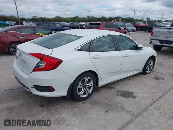 2020 Honda Civic LX with VIN 2HGFC2F69LH521681, listed as a IAAI auction lot 41664332 with 37,038 mi miles and . Bid and sale history available at DreamBid. Image 4.