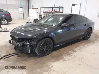 2015 Audi S7 with VIN WAUW2AFC0FN015327, listed as a IAAI auction lot 41964788 with 145,953 mi miles. Bid and sale history available at carsss.com. Image 2.