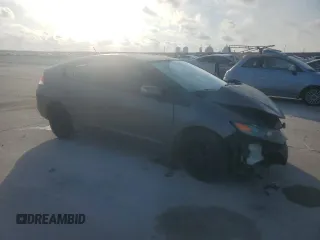 2010 Honda Insight EX with VIN JHMZE2H72AS025427, listed as a Copart auction lot 54983775 with 184,052 mi miles and Salvage Title. Bid and sale history available at DreamBid. Image 4.