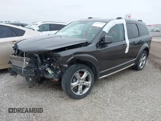 2017 Dodge Journey Crossroad Plus with VIN 3C4PDCGB5HT517269, listed as a IAAI auction lot 41835856 with 97,876 mi miles and . Bid and sale history available at DreamBid. Image 2.