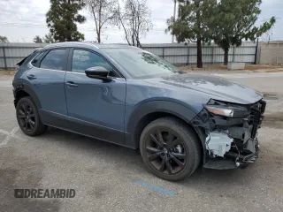 2023 Mazda CX-30 S Carbon Edition with VIN 3MVDMBCM5PM560912, listed as a Copart auction lot 59174445 with 5,247 mi miles and Salvage title. Bid and sale history available at DreamBid. Image 4.