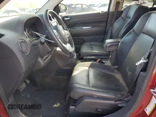 2016 Jeep Compass High Altitude Edition with VIN 1C4NJDEB0GD729476, listed as a Copart auction lot 52014075 with 144,978 mi miles and Salvage Title. Bid and sale history available at carsss.com. Image 7.