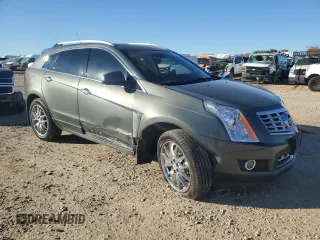 2013 Cadillac SRX Premium Collection z VIN 3GYFNEE35DS605779, wystawiony jako Copart lot #84451744 z przebiegiem 60 339 mil mil oraz Czysty tytuł • Clean title. Historia ofert i sprzedaży dostępna na DreamBid. Obrazek 4.