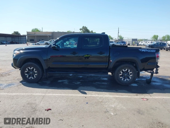 2021 Toyota Tacoma SR z VIN 3TMCZ5AN3MM421868, wystawiony jako IAAI lot #42003665 z przebiegiem 39 380 mil mil oraz . Historia ofert i sprzedaży dostępna na DreamBid. Obrazek 14.