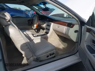 2001 Cadillac Eldorado Touring ETC z VIN 1G6ET12991B104624, wystawiony jako IAAI lot #41616324 z przebiegiem Nie podano mil oraz . Historia ofert i sprzedaży dostępna na DreamBid. Obrazek 5.