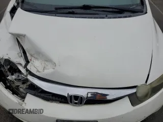 2009 Honda Civic LX z VIN 1HGFA16529L009019, wystawiony jako Copart lot #58039395 z przebiegiem 234 332 mil mil oraz Szkoda całkowita • Salvage title. Historia ofert i sprzedaży dostępna na DreamBid. Obrazek 11.