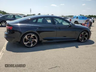 2023 Audi RS 5 Sportback z VIN WUAAWCF54PA900981, wystawiony jako Copart lot #62860383 z przebiegiem 4779 mil mil oraz . Historia ofert i sprzedaży dostępna na DreamBid. Obrazek 3.