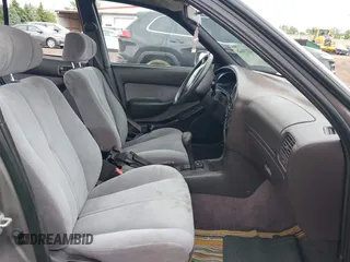 1995 Toyota Camry LE z VIN 4T1SK12E0SU634143, wystawiony jako IAAI lot #42274448 z przebiegiem 159 962 mil mil oraz . Historia ofert i sprzedaży dostępna na DreamBid. Obrazek 5.
