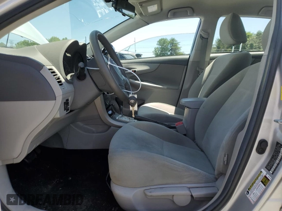 2010 Toyota Corolla with VIN 2T1BU4EEXAC533795, listed as a Copart auction lot 61817185 with 93,322 mi miles and Salvage title. Bid and sale history available at DreamBid. Image 7.