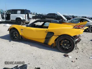 2005 Lotus Elise z VIN SCCPC11105HL30103, wystawiony jako Copart lot #87713445 z przebiegiem Nie podano mil oraz Szkody całkowita. Historia ofert i sprzedaży dostępna na DreamBid. Obrazek 2.