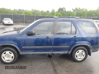 2004 Honda CR-V LX with VIN SHSRD68404U201676, listed as a IAAI auction lot 42109894 with 281,006 mi miles and . Bid and sale history available at carsss.com. Image 14.