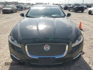 2014 Jaguar XJ with VIN SAJWA2GT0EMV61531, listed as a Copart auction lot 61071054 with 79,266 mi miles and Clean Title. Bid and sale history available at DreamBid. Image 5.