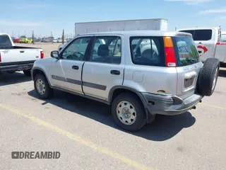 1999 Honda CR-V LX z VIN JHLRD2840XC020288, wystawiony jako IAAI lot #42350138 z przebiegiem 147 850 mil mil oraz . Historia ofert i sprzedaży dostępna na DreamBid. Obrazek 3.