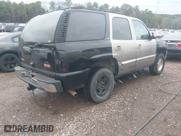 2003 GMC Yukon SLT with VIN 1GKEC13Z43J327937, listed as a IAAI auction lot 41543517 with 277,485 mi miles. Bid and sale history available at carsss.com. Image 4.