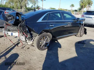 2014 Cadillac XTS with VIN 2G61L5S34E9261034, listed as a IAAI auction lot 41250779 with 178,218 mi miles. Bid and sale history available at carsss.com. Image 4.