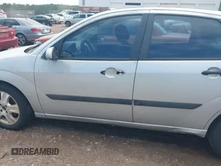 2005 Ford Focus S с VIN 1FAFP34N95W101125, выставлен на аукционе IAAI как лот 42647066 с пробегом 343 586 миль миль и . История ставок и продаж доступна на DreamBid. Изображение 6.