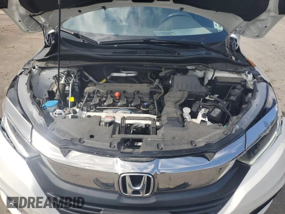 2021 Honda HR-V LX with VIN 3CZRU6H30MM718531, listed as a Copart auction lot 57288955 with 21,556 mi miles and Salvage title. Bid and sale history available at DreamBid. Image 12.