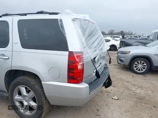 2014 Chevrolet Tahoe LTZ z VIN 1GNSCCE04ER159110, wystawiony jako IAAI lot #41615653 z przebiegiem 171 422 mil mil oraz . Historia ofert i sprzedaży dostępna na DreamBid. Obrazek 6.
