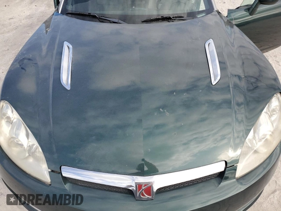2007 Saturn Sky z VIN 1G8MB33B97Y100033, wystawiony jako Copart lot #76378344 z przebiegiem Nie podano mil oraz Szkody całkowita. Historia ofert i sprzedaży dostępna na DreamBid. Obrazek 11.
