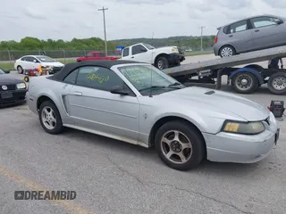 2002 Ford Mustang Deluxe z VIN 1FAFP44462F145026, wystawiony jako IAAI lot #42044610 z przebiegiem 113 751 mil mil oraz . Historia ofert i sprzedaży dostępna na DreamBid. Obrazek 1.