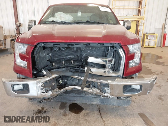 2015 Ford F-150 XLT with VIN 1FTEW1EG8FFA41398, listed as a IAAI auction lot 42102711 with 129,812 mi miles and . Bid and sale history available at DreamBid. Image 6.