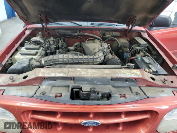 1999 Ford Explorer Sport z VIN 1FMYU24X3XUB23512, wystawiony jako Copart lot #82668734 z przebiegiem 228 701 mil mil oraz Szkoda całkowita • Salvage title. Historia ofert i sprzedaży dostępna na DreamBid. Obrazek 12.