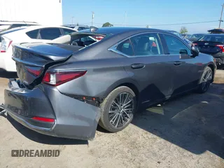 2022 Lexus ES 300h with VIN 58ADA1C15NU026266, listed as a IAAI auction lot 42121610 with 18,059 mi miles and . Bid and sale history available at DreamBid. Image 4.