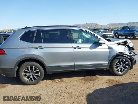 2019 Volkswagen Tiguan SE with VIN 3VV2B7AX1KM170926, listed as a IAAI auction lot 41953801 with 54,361 mi miles and . Bid and sale history available at DreamBid. Image 13.
