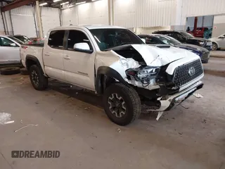 2021 Toyota Tacoma SR z VIN 5TFCZ5AN1MX268370, wystawiony jako IAAI lot #41922632 z przebiegiem 50 358 mil mil oraz . Historia ofert i sprzedaży dostępna na DreamBid. Obrazek 1.