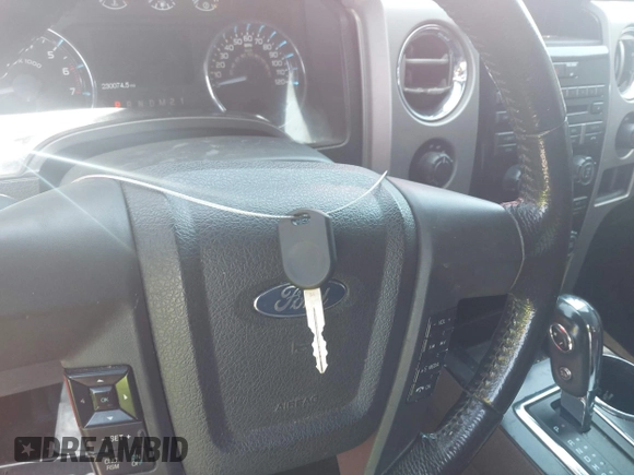 2011 Ford F-150 XLT with VIN 1FTFW1ET5BFC42624, listed as a IAAI auction lot 41853696 with 230,074 mi miles and . Bid and sale history available at DreamBid. Image 11.
