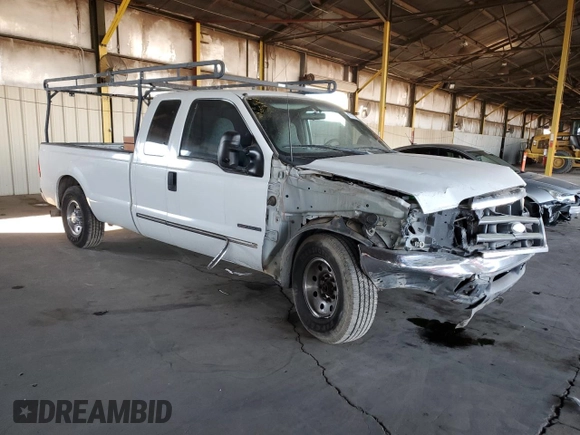 1999 Ford F-250 XL with VIN 1FTNX20FXXEE59499, listed as a Copart auction lot 87511735 with 215,520 mi miles and Salvage title. Bid and sale history available at DreamBid. Image 4.