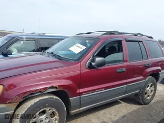 2001 Jeep Grand Cherokee Laredo with VIN 1J4GW48S51C739725, listed as a IAAI auction lot 41800431 with 220,396 mi miles. Bid and sale history available at carsss.com. Image 14.