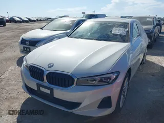 2023 BMW 3 Series 330e xDrive with VIN 3MW39FS0XP8D03304, listed as a IAAI auction lot 41358861 with 33,899 mi miles. Bid and sale history available at carsss.com. Image 2.