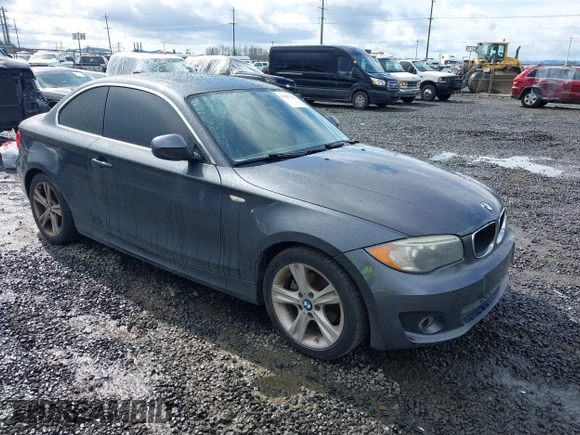 2013 BMW 1 Series 128i with VIN WBAUP7C5XDVP24796, listed as a IAAI auction lot 41807533 with 157,614 mi miles and . Bid and sale history available at carsss.com. Image 1.
