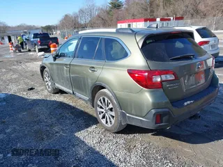 2019 Subaru Outback Touring with VIN 4S4BSATC7K3272301, listed as a IAAI auction lot 41318172 with 102,417 mi miles and . Bid and sale history available at DreamBid. Image 3.