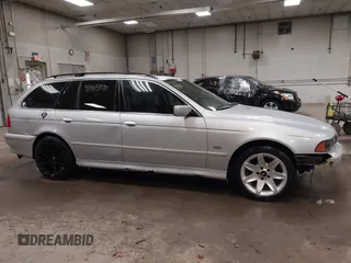 2003 BMW 5 Series 525iT with VIN WBADS33413GD50535, listed as a IAAI auction lot 41405870 with 180,748 mi miles. Bid and sale history available at carsss.com. Image 14.