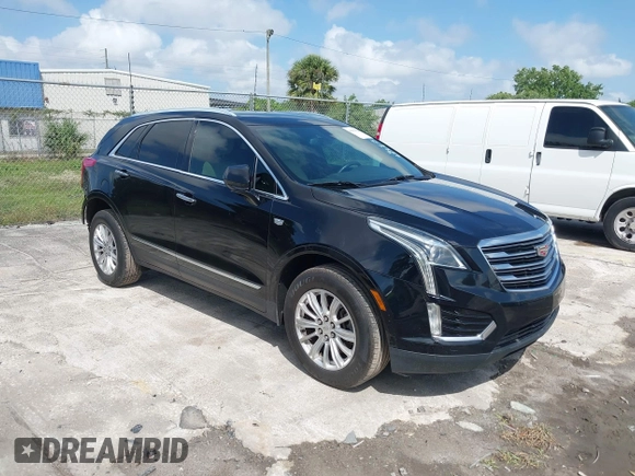 2017 Cadillac XT5 FWD with VIN 1GYKNARS6HZ123114, listed as a IAAI auction lot 41933928 with 166,213 mi miles. Bid and sale history available at carsss.com. Image 1.