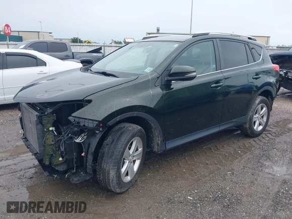 2013 Toyota RAV4 XLE with VIN 2T3RFREV2DW093538, listed as a IAAI auction lot 42404926 with 55,215 mi miles and . Bid and sale history available at DreamBid. Image 2.