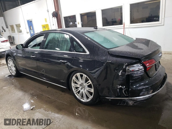 2015 Audi A8 4.0T z VIN WAU32AFD0FN017865, wystawiony jako Copart lot #37065594 z przebiegiem 55 632 mil mil oraz Szkoda całkowita • Salvage title. Historia ofert i sprzedaży dostępna na DreamBid. Obrazek 2.