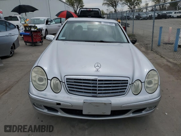 2003 Mercedes-Benz E-Class 5.0L with VIN WDBUF70J03A112909, listed as a Copart auction lot 49924865 with 158,244 mi miles and Salvage Title. Bid and sale history available at carsss.com. Image 5.